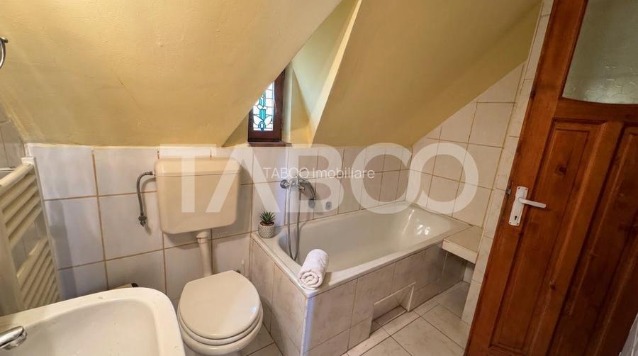 Casa de vanzare 6 camere loc de relaxare garaj teren 669 mp Cornatel - 15