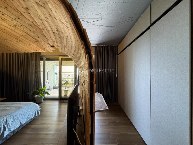 Un apartament ca o casa, cu peluza si ponton pe lac - 15