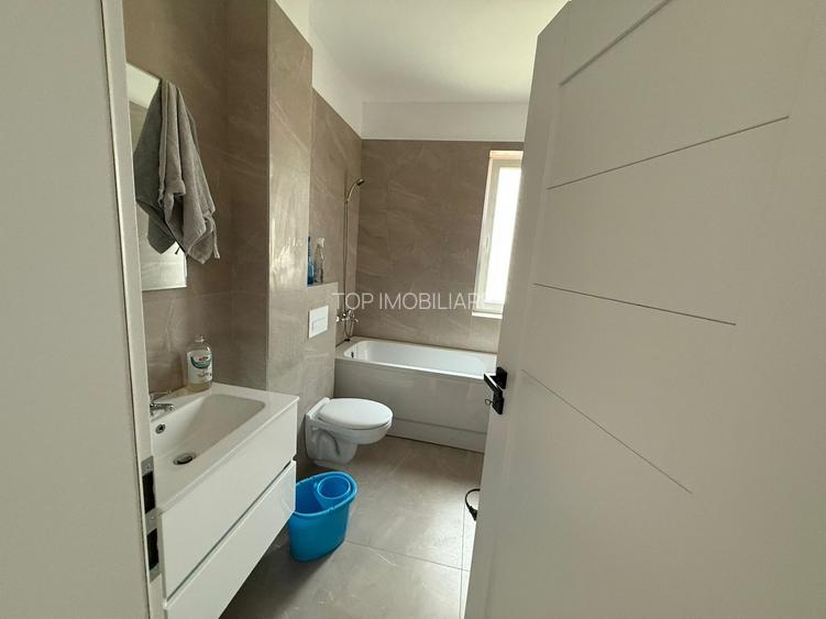 APARTAMENT DECOMANDAT CU TERASA DE 18 MP SI GRADINA  - - 6