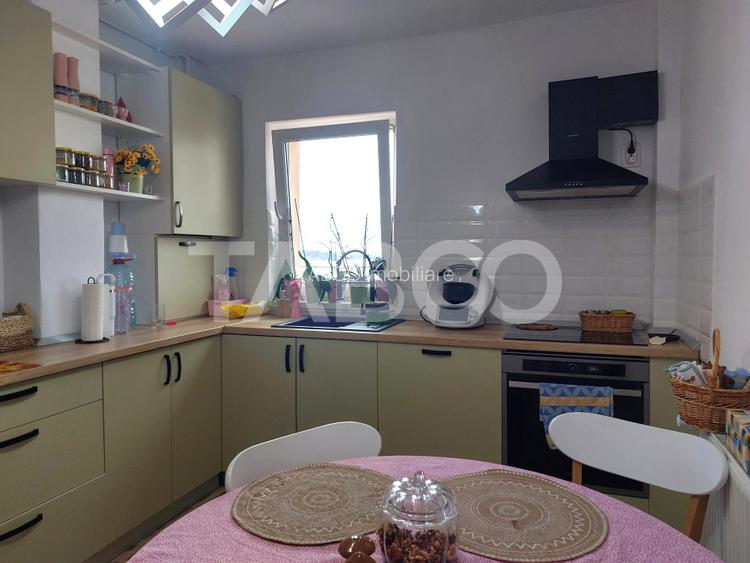 Apartament renovat 66 mp 3 camere 2 bai balcon pivnita Cisnadie - 4