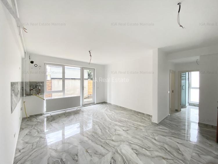Apartament si curte in imobil finalizat aproape de plaja - 4