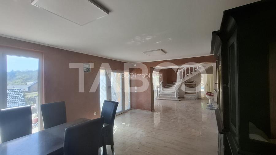 Casa de vanzare 405 mp utili 2 garaje 250 mp terase Slimnic Sibiu - 16