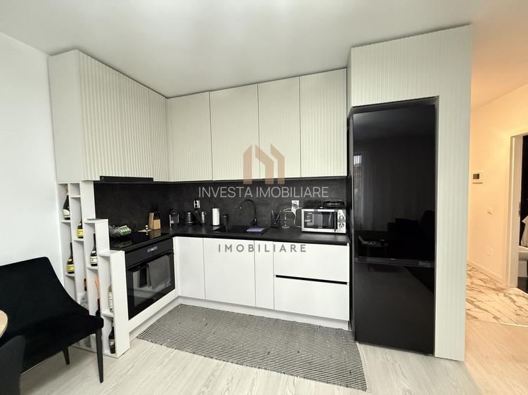 Locuință elegantă cu terasă generoasă și parcare subterană - 3