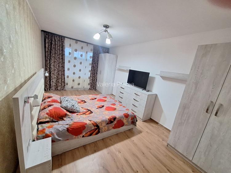 Închiriez apartament spatios cu 2 camere,parter,zona Calea Moldovei,parcare incl - 3