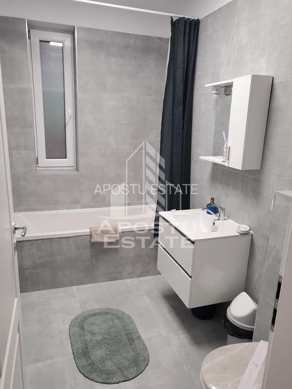 Apartament cu doua camere, centrala proprie , terasa ,in Giroc - 11
