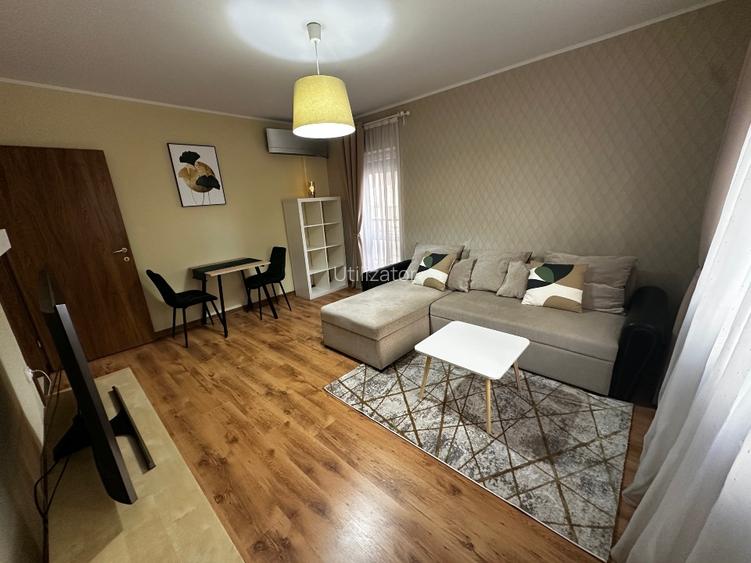  Închiriez apartament cu 2 camere decomandate și parcare privată  - 9