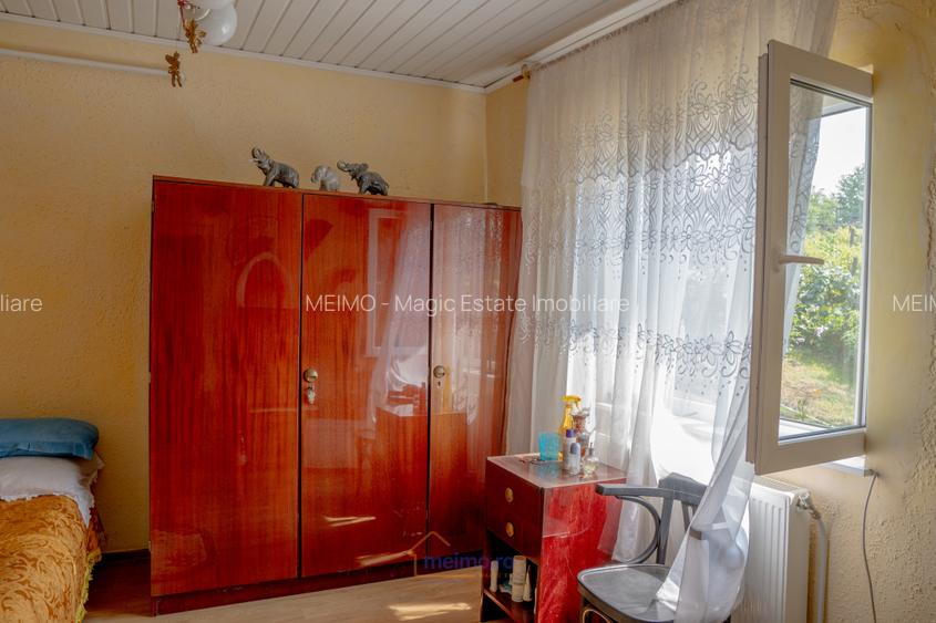 O casă, un teren, mai multe opțiuni – Comănești, Str. Moldovei - 5