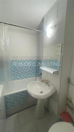 Dristor, garsoniera luminoasa in bloc mixt - 7