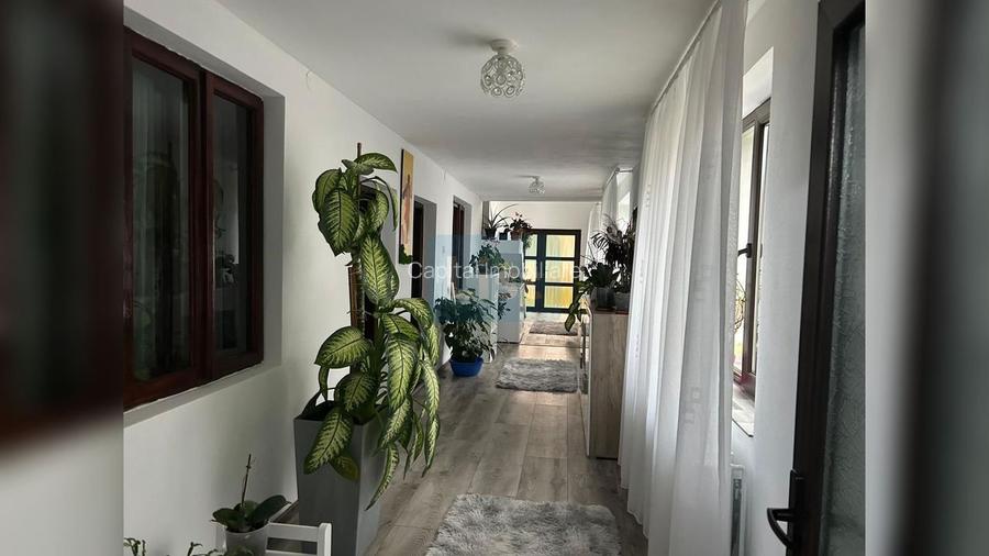 Casă P+M renovată, teren generos de 3000 m² – Bălești - 10