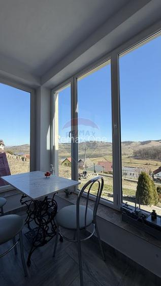 Casă cu vedere spectaculoasă - pentru locuit sau investiție turistică - 12