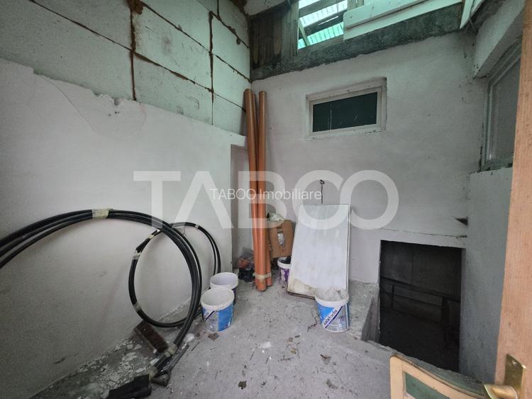 Casa individuala de vanzare 54mpu curte propie 69mp zona Central Sibiu - 9