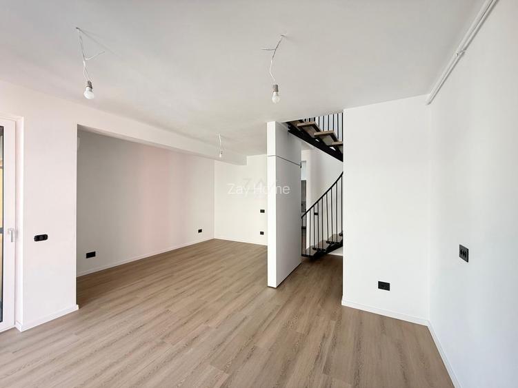 Ap pe 2 niveluri. 4 camere, 2 bai. 2 locuri de parcare. - 3