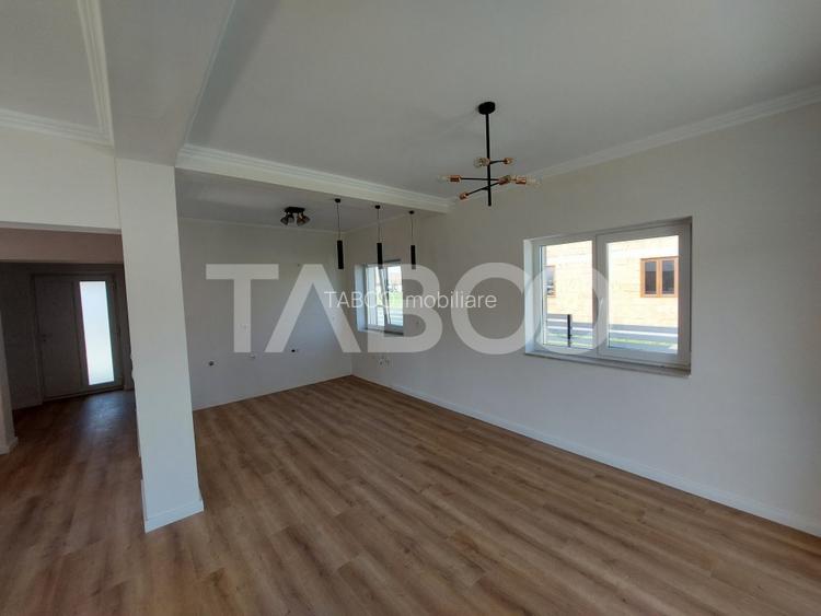 Casa de vanzare 4 camere 3 bai 119 mp cu teren 470 metri in Talmaciu - 8