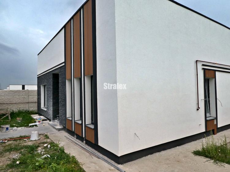 Casa individuala  cu 4 camere si 2 bai