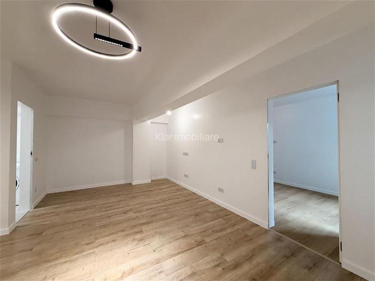 Apartament 2 Camere 65m2 utili Pe Strada București - 4