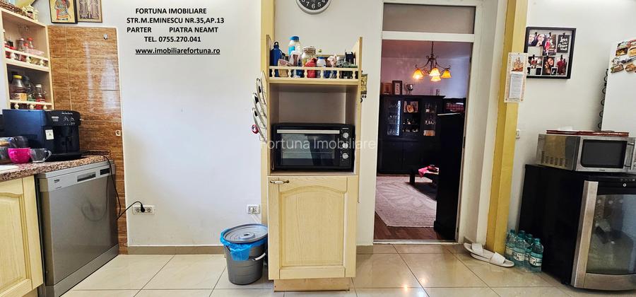 Locuinta individuala(apartament 4 camere)+spatiu comercial si teren ,Darmanesti - 4