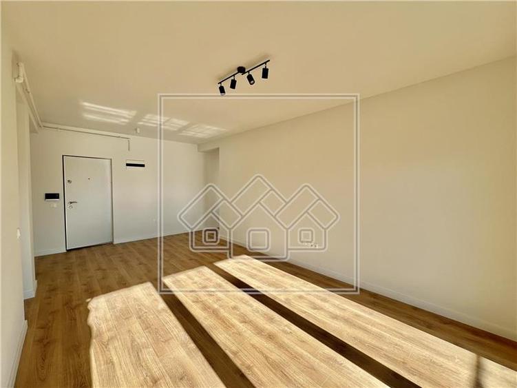 Ap. 2 camere, terasa 12.45 mp, aer conditionat, finisat la cheie
