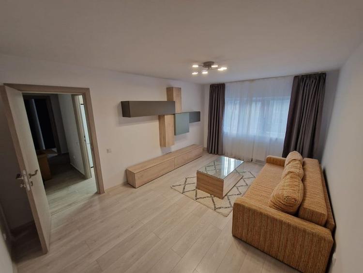 Apartament 2 camere Racadau-intrare,mobilat-utilat,modern,128000 Euro