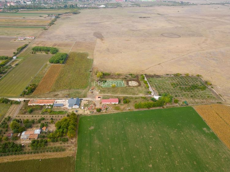 Casă cu teren 13 418 mp intravilan
