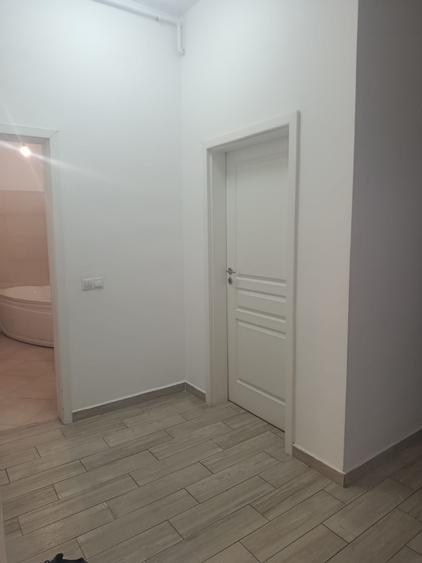 Apartament de vânzare – 135 mp, curte proprie și parcare subterană dublă
