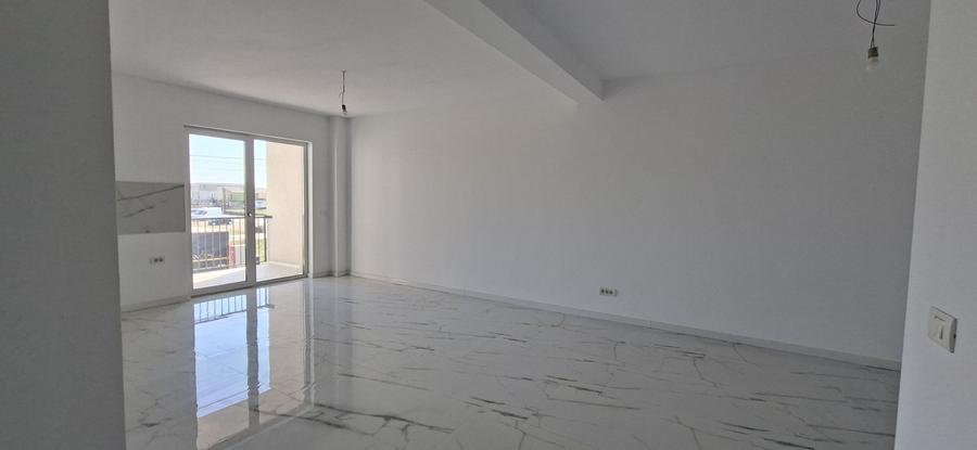 Apartament cu 3 camere si un loc de parcare