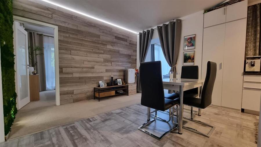 Apartament spatios, cu gradina, modern amenajat