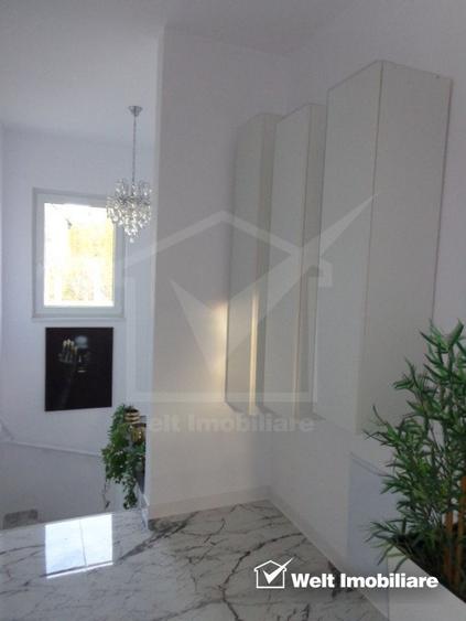 Casa individuala finisata P+E, 4 dormitoare,3 parcari intrare Chinteni