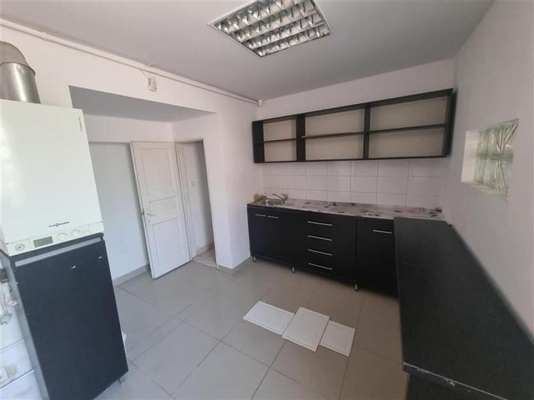 Apartament de 62 mp , parte din casa, cu intrare separata, posibil spatiu comerc