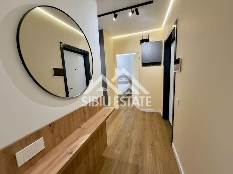 Apartament central finisare premium parcare subterana imobil nou