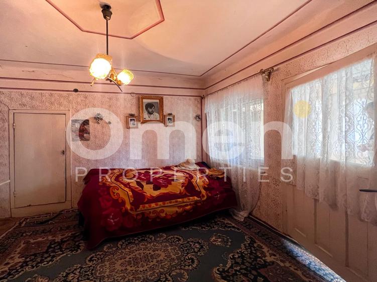 Casă bătrânească | 1500 mp teren, | Tăuții-Măgherăuș.