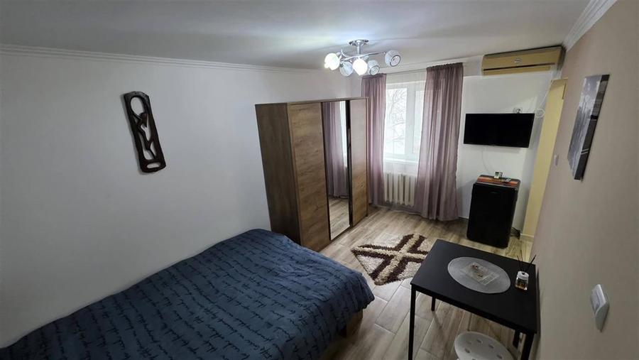 Garsoniera de vanzare zona piata sud, etaj 3/4 mobilata si utilata