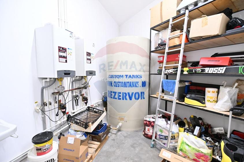 Proprietate premium în Filiași, locuință de lux cu spații comerciale - 30