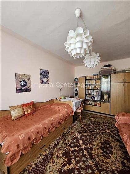 Apartament cu GRADINA SI ACOPERIS  MANSARDA DE VANZARE IN ONESTI ETJ 1 - 5