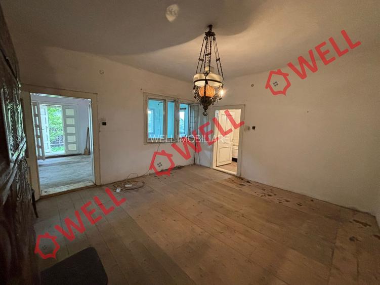 Casă de familie cu 2 niveluri de vânzare în Mereni, la drumul principal! - 9