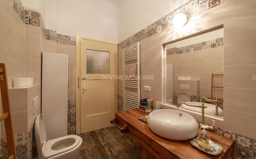 Apartament cu 4 camere, suprafata de 135 mp, garaj si beci in inima orasului   - 13