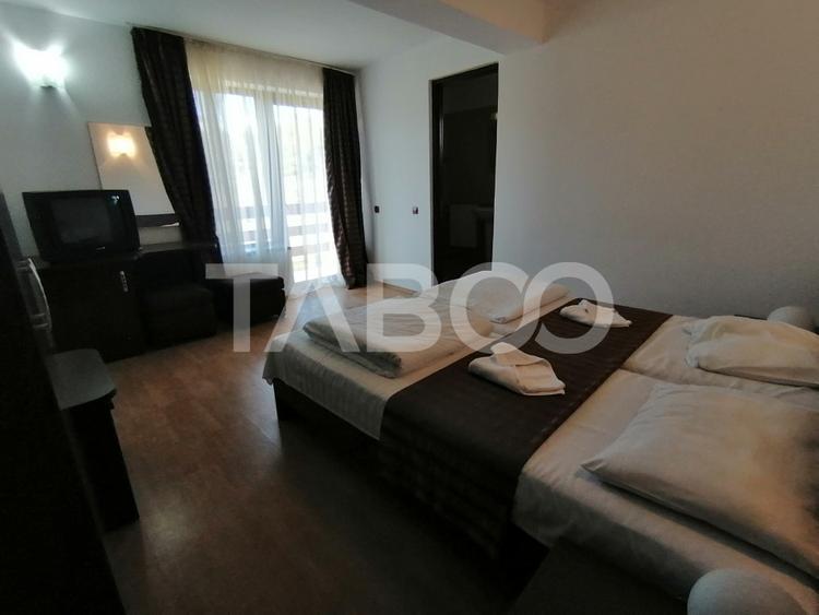 Pensiune 13 camere 16 bai sauna piscina si teren 1565 mp Cisnadioara