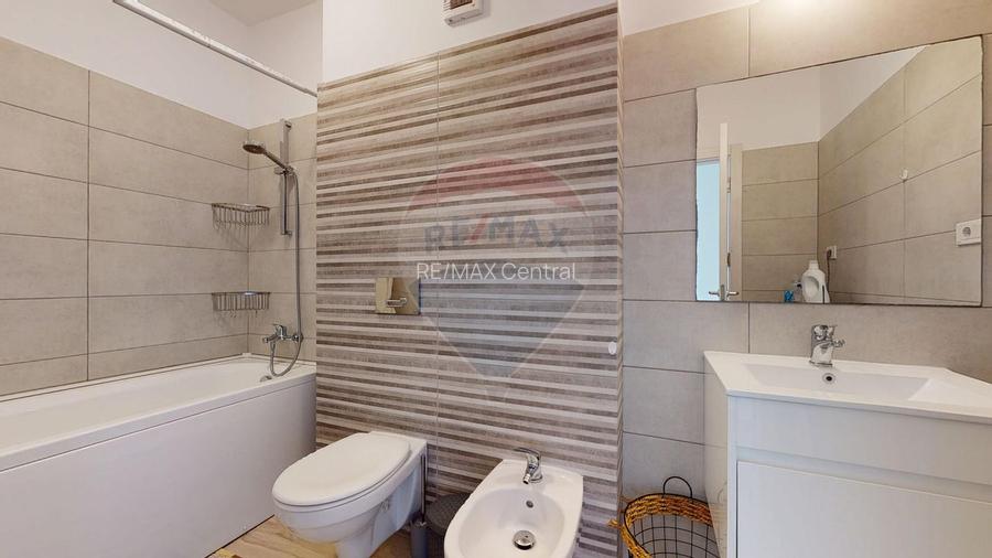 Apartament cu 2 camere de închiriat în zona Tractorul - 13