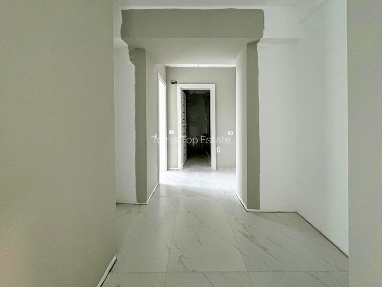 Apartatment cu 2 camere, decomandate, cu 2bai - cu loc de parcare inclus - 6