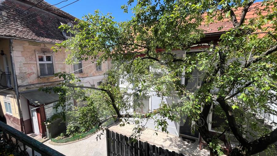 2 camere în inima orașului – ideal pentru locuit sau investiție - 9