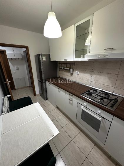  Închiriez apartament cu 2 camere decomandate și parcare privată  - 4