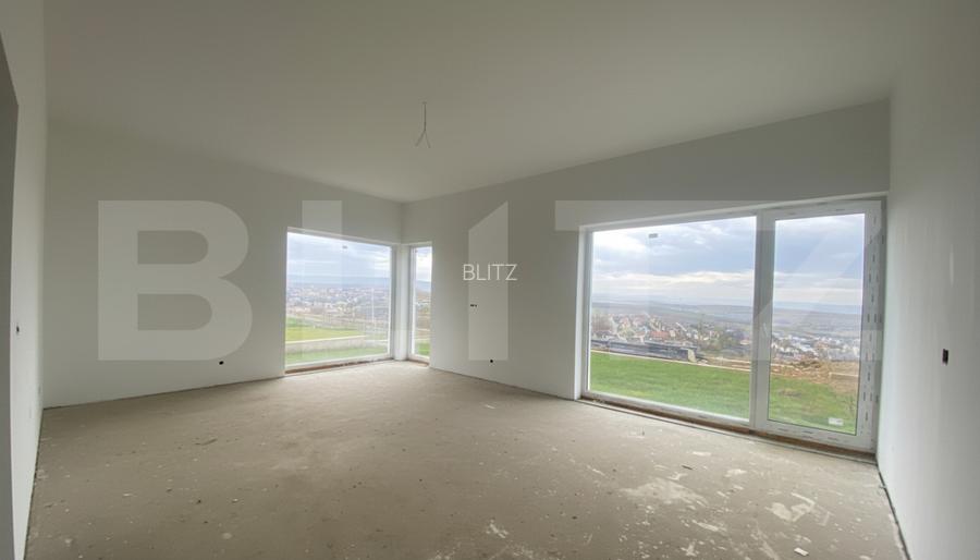 Casa pe calcan cu priveliste deschisa si compartimentare deosebita. - 4