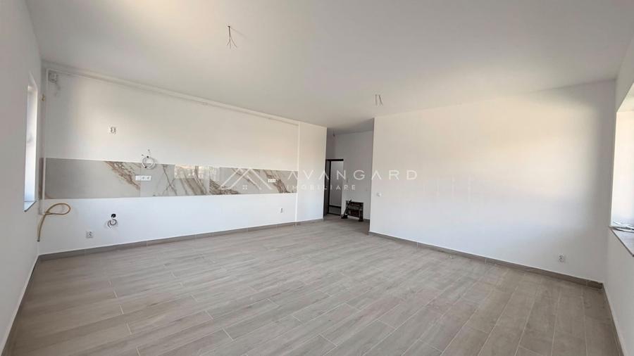 Apartament 3 camere, 2 bai, finisat, bucătărie mobilată