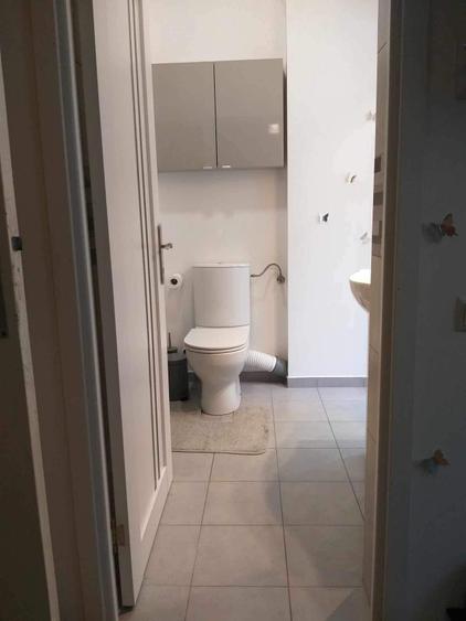 Piata KOGALNICEANU,apartament cochet in imobil interbelic creditabil la CISMIGIU