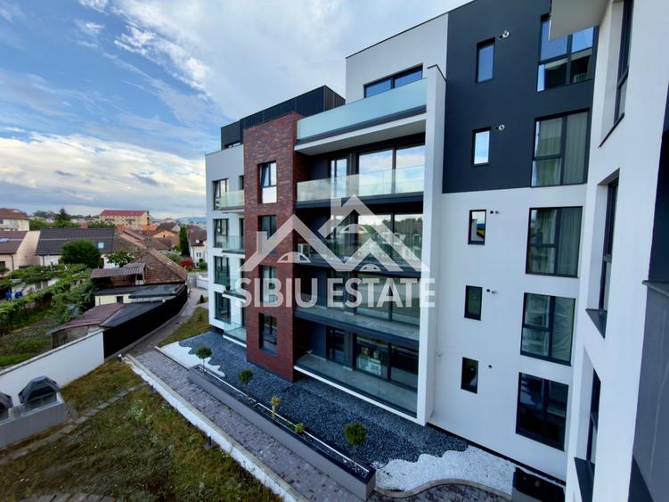 Apartament central finisare premium parcare subterana imobil nou