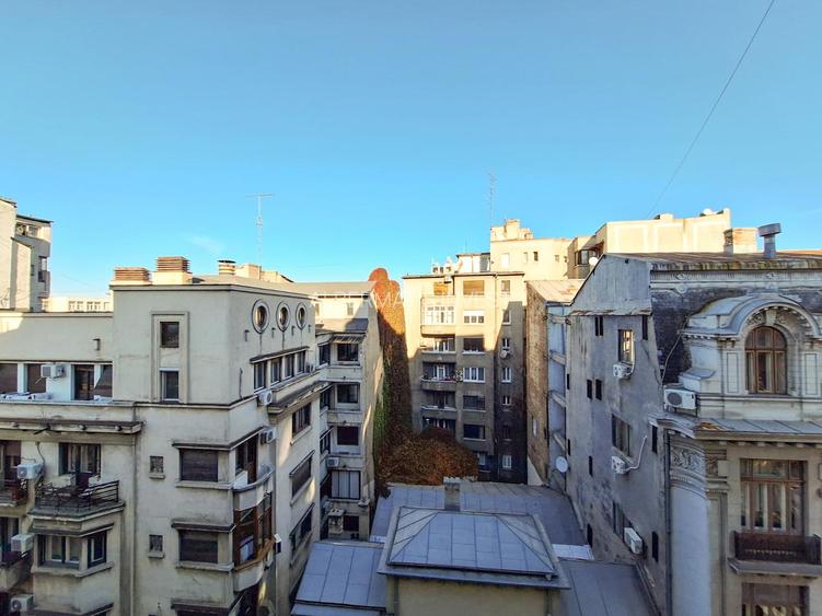 Vinzare apartament renovat cu design italian in  Piata Romana - 19