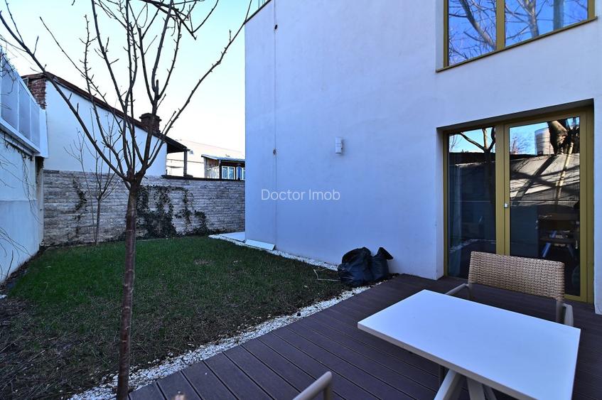 Rafinament, liniște și spațiu exterior privat în centrul Bucureștiului - 22