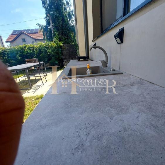 Apartament in vila, dispunere pe 3 niveluri. Gradina proprie. Terasa de 31 mp. - 12