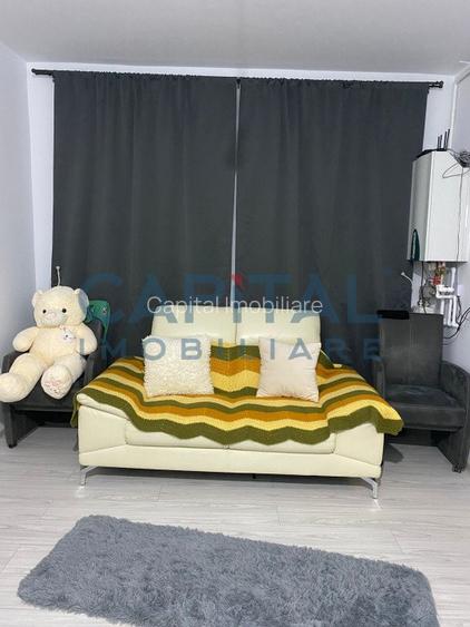 Constructie cu 3 apartamente + teren+ 2 spatii comerciale - 10