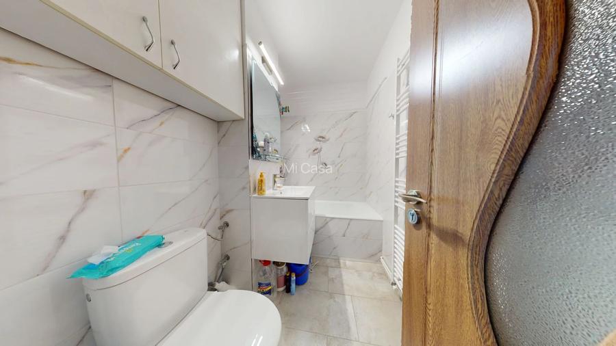 Garsoniera renovata,mobilata la schimb sau vanzare - 7