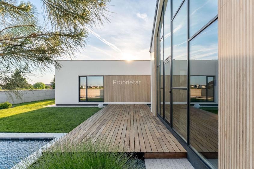 Casă Parter cu Design Minimalist și Piscină - 2